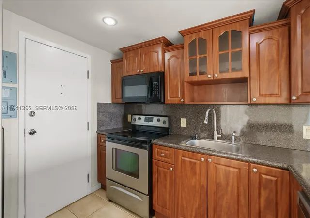 Listing Photo 3 - Condo for sale in building located at 437 Golden Isles Dr, Hallandale Beach, FL 33009 - Unit #4D