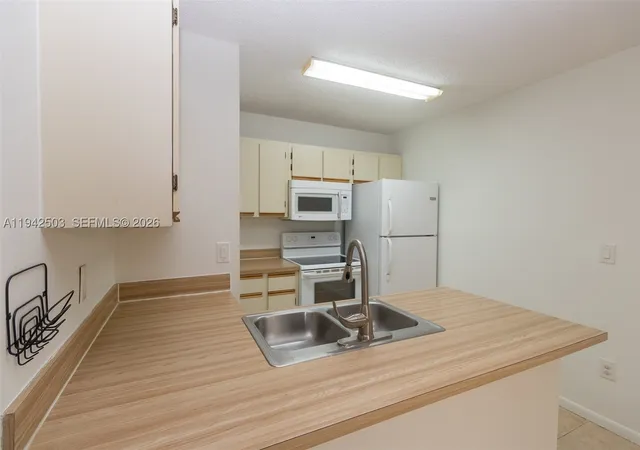 Listing Photo 3 - Condo for sale in building located at 18328 Nw 68Th Ave, Miami, FL 33015 - Unit #P
