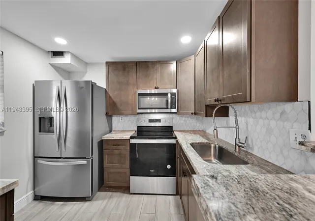 Condo for sale at 2850 Somerset Dr #105L, Lauderdale Lakes, FL 33311 | MLS# A11943395 | Listing updated on 2026-09-23
