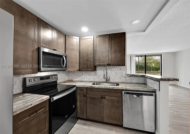 Photo 1 of Condo for sale at 2850 Somerset Dr #105L, Lauderdale Lakes, FL 33311 | MLS# A11943395 | Listing updated on 2026-09-23
