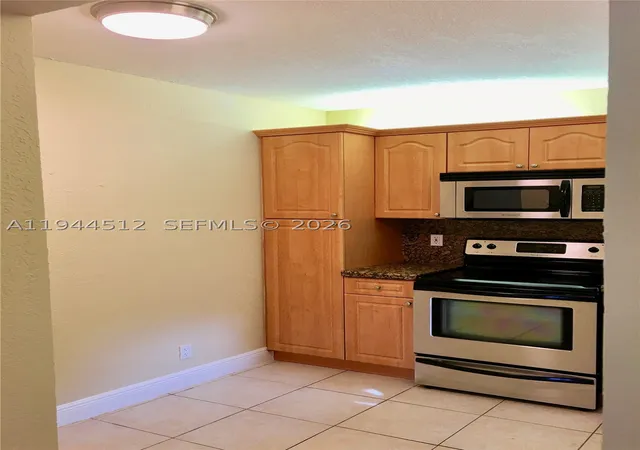 Photo 3 of Sale Pending at 3818 Coral Tree Cir #3818, Coconut Creek, FL 33073 | MLS# A11944512 | Listing updated on 2026-09-02