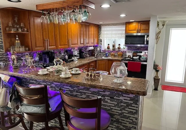 Photo 4 of Townhouse for sale at 4211 W 10Th Ln, Hialeah, FL 33012 | MLS# A11943660 | Listing updated on 2026-09-25