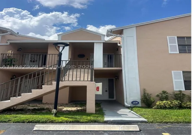 Listing Photo 1 - Condo for sale in building located at 1200 N Liberty Ave, Homestead, FL 33034 - Unit #1200G