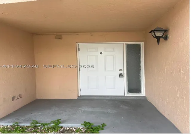 Listing Photo 2 - Condo for sale in building located at 1200 N Liberty Ave, Homestead, FL 33034 - Unit #1200G