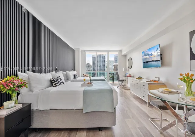 Listing Photo 1 - Condo for sale in building located at 2889 Mcfarlane Rd, Miami, FL 33133 - Unit #1409