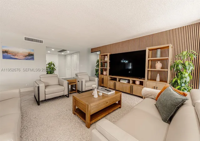 Listing Photo 1 - Condo for sale in building located at 1800 Ne 114Th St, Miami, FL 33181 - Unit #909