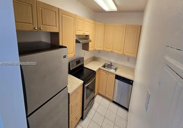 Photo 1 of Condo for sale at 405 S Pine Island Rd #202D, Plantation, FL 33324 | MLS# A11953485 | Listing updated on 2026-09-04