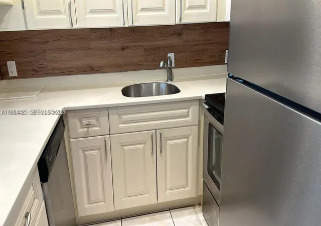 Photo 2 of Condo for sale at 4848 Nw 24th Ct #210, Lauderdale Lakes, FL 33313 | MLS# A11954423 | Listing updated on 2026-09-16