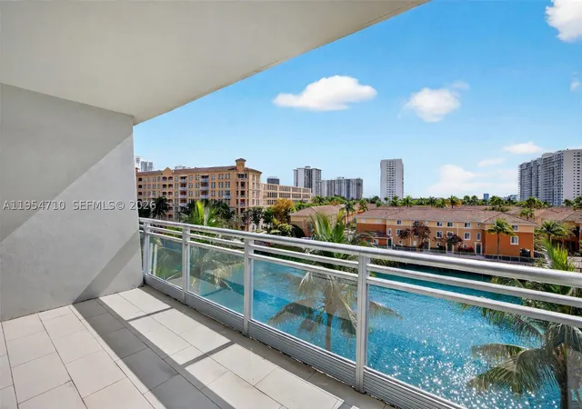 Listing Photo 1 - Condo for sale in building located at 2950 Ne 188Th St, Miami, FL 33180 - Unit #302