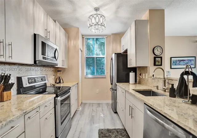 Listing Photo 2 - Condo for sale in building located at 2421 Ne 65Th St, North Lauderdale, FL 33308 - Unit #202