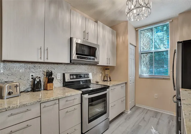 Listing Photo 3 - Condo for sale in building located at 2421 Ne 65Th St, North Lauderdale, FL 33308 - Unit #202