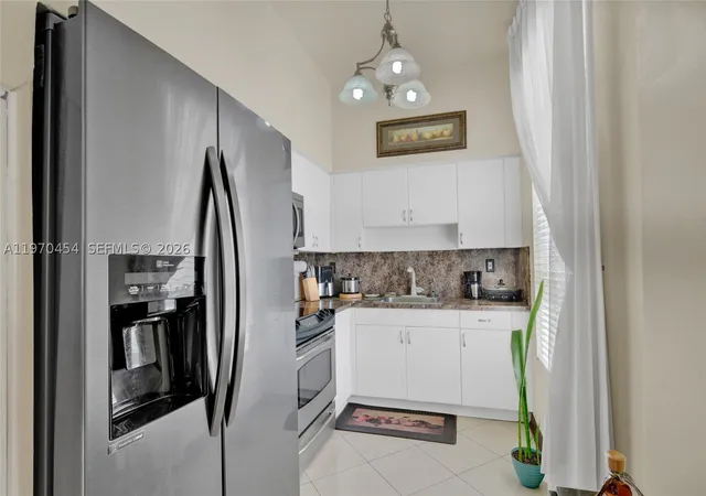 Photo 3 of Condo for sale at 7400 W 20Th Ave #402, Hialeah, FL 33016 | MLS# A11970454 | Listing updated on 2026-10-06