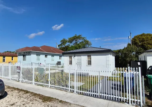 Photo 1 of Multi family home for sale at 1827 Nw 74th Ter, Miami, FL 33147 | MLS# A11971448 | Listing updated on 2026-09-10