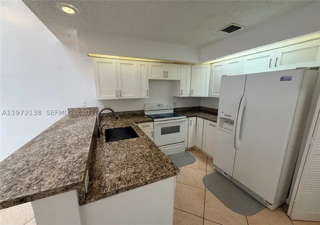 Photo 3 of Sale Pending at 1818 Racquet Ct, North Lauderdale, FL 33068 | MLS# A11972138 | Listing updated on 2026-09-11