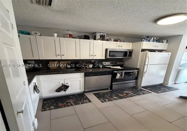 Photo 2 of Townhouse for sale at 20305 Nw 27th Ct, Miami Gardens, FL 33056 | MLS# A11973611 | Listing updated on 2026-09-18