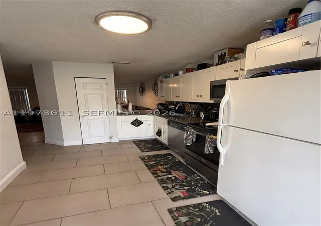 Photo 3 of Townhouse for sale at 20305 Nw 27th Ct, Miami Gardens, FL 33056 | MLS# A11973611 | Listing updated on 2026-09-18