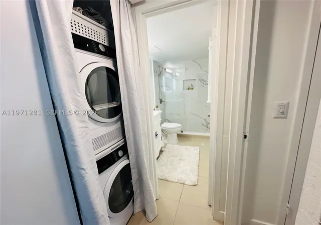 Listing Photo 5 - Condo for sale in building located at 301 Golden Isles Dr, Hallandale Beach, FL 33009 - Unit #114