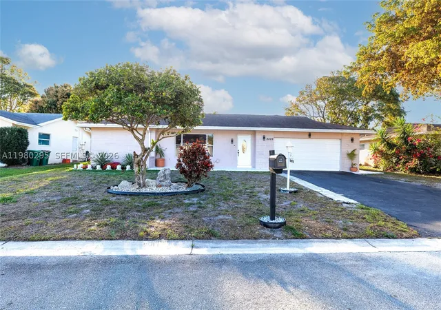 Photo 2 of Single family home for sale at 8209 Nw 91st Ave, Tamarac, FL 33321 | MLS# A11980295 | Listing updated on 2026-08-26