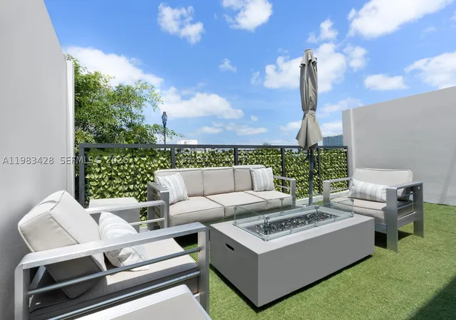 Photo 2 of Townhouse for sale at 1065 99th St, Bay Harbor Islands, FL 33154 | MLS# A11983428 | Listing updated on 2026-09-08