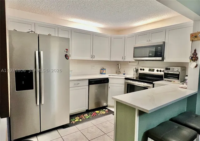 Photo 3 of Sale Pending at 434 Pine Glen Ln #A-1, Greenacres, FL 33463 | MLS# A11975806 | Listing updated on 2026-08-26