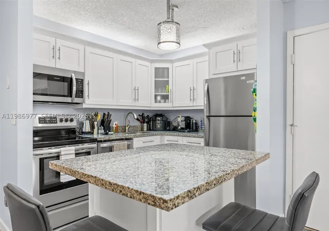 Photo 2 of Condo for sale at 10709 W Clairmont Cir #111, Tamarac, FL 33321 | MLS# A11986977 | Listing updated on 2026-09-09