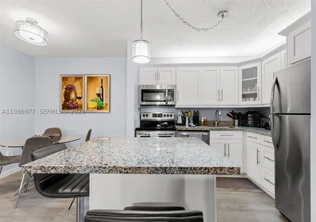 Listing Photo 5 - Condo for sale in building located at 10709 W Clairmont Cir, Tamarac, FL 33321 - Unit #111