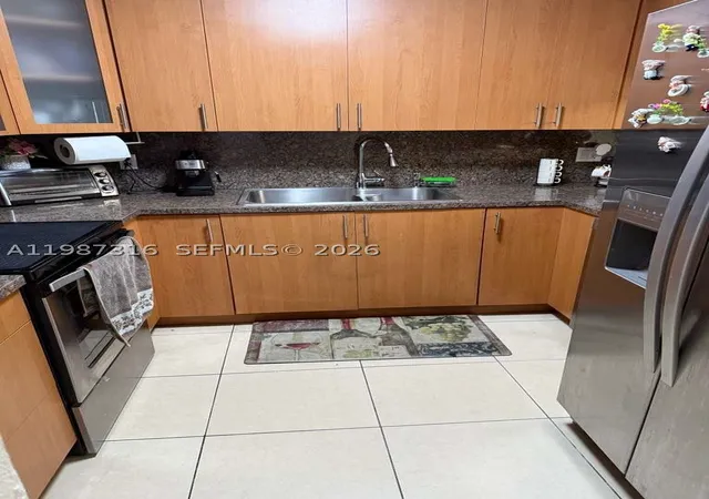 Photo 3 of Condo for sale at 1900 W 68Th St #A205, Hialeah, FL 33014 | MLS# A11987316 | Listing updated on 2026-09-30