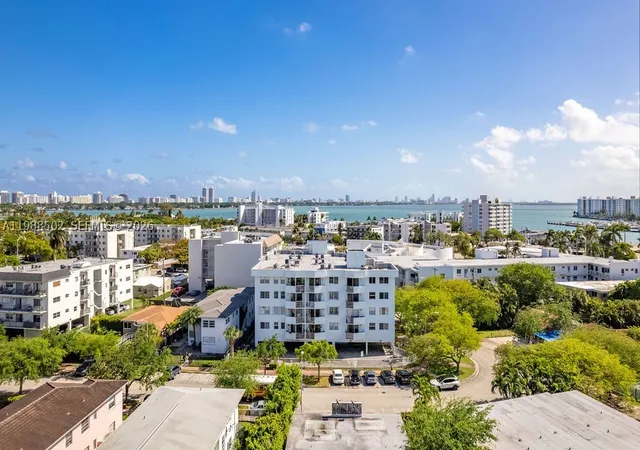 Listing Photo 1 - Condo for sale in building located at 1990 Marseille Dr, Miami, FL 33141 - Unit #402