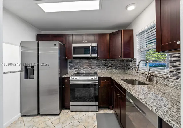 Photo 2 of Condo for sale at 9540 Sunrise Lakes Blvd #103, Sunrise, FL 33322 | MLS# A11986248 | Listing updated on 2026-09-09