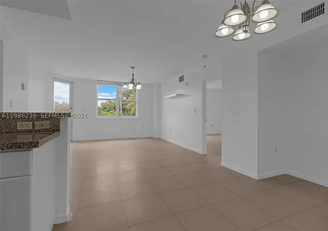 Photo 1 of Condo for sale at 1555 N Treasure Dr #205, North Bay Village, FL 33141 | MLS# A11986238 | Listing updated on 2026-09-23