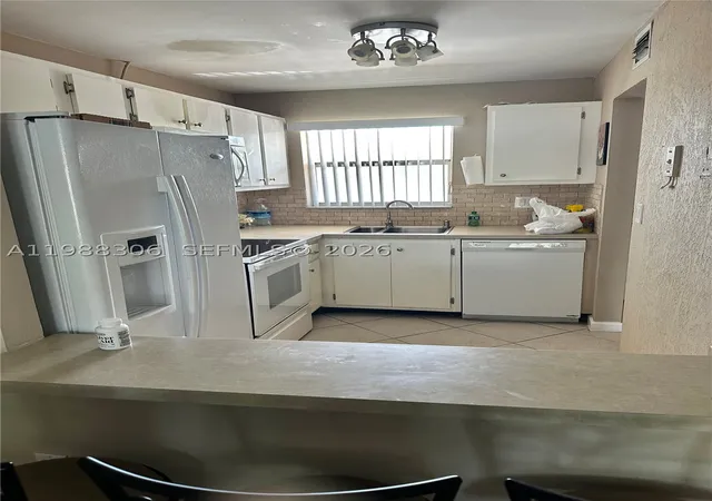 Listing Photo 5 - Condo for sale in building located at 2701 E Sunrise Lakes Dr, Sunrise, FL 33322 - Unit #209