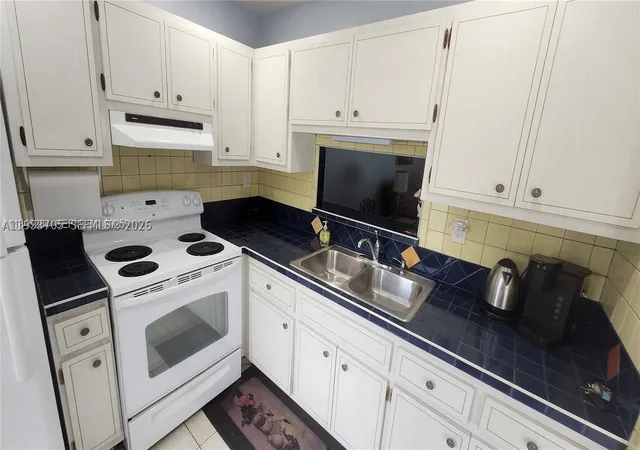 Photo 1 of Condo for sale at 4299 Nw 16Th St #209, Lauderhill, FL 33313 | MLS# A11993705 | Listing updated on 2026-09-04