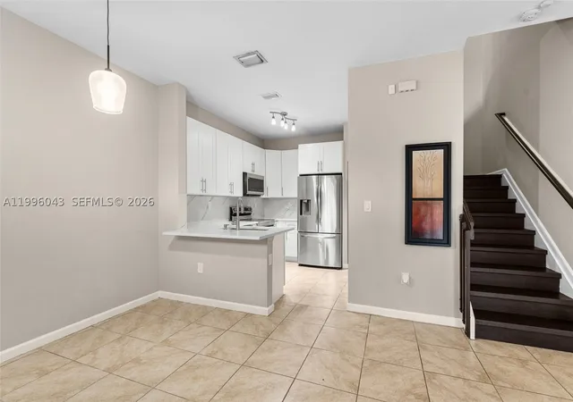 Photo 3 of Townhouse for sale at 3540 Nw 30th Pl, Lauderdale Lakes, FL 33311 | MLS# A11996043 | Listing updated on 2026-09-01