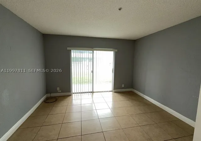 Listing Photo 1 - Condo for sale in building located at 4251 Nw 5Th St, Plantation, FL 33317 - Unit #108