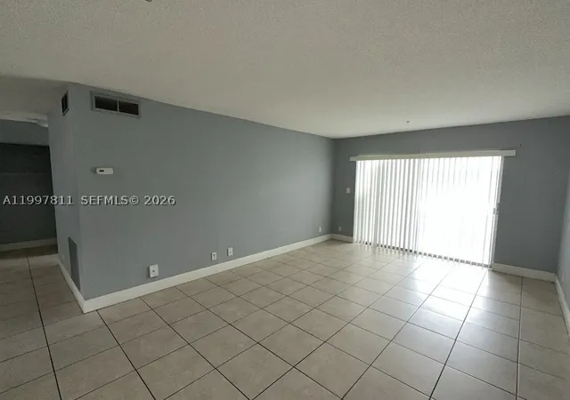 Listing Photo 2 - Condo for sale in building located at 4251 Nw 5Th St, Plantation, FL 33317 - Unit #108