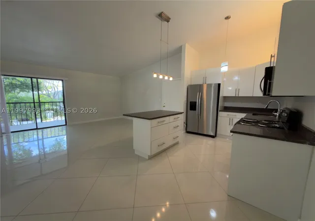 Photo 3 of Condo for sale at 907 Ne 199Th St #204, Miami, FL 33179 | MLS# A11997993 | Listing updated on 2026-09-10