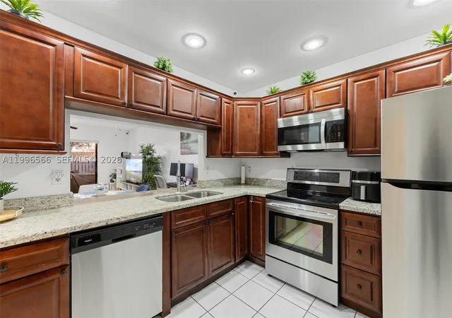 Photo 3 of Townhouse for sale at 10500 Nw 3rd St, Pembroke Pines, FL 33026 | MLS# A11996566 | Listing updated on 2026-09-13