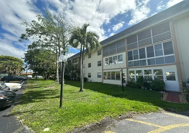 Photo 2 of Condo for sale at 4980 E Sabal Palm Blvd #330, Tamarac, FL 33319 | MLS# A12000455 | Listing updated on 2026-09-16