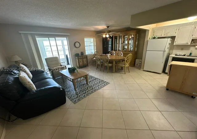 Photo 3 of Condo for sale at 4980 E Sabal Palm Blvd #330, Tamarac, FL 33319 | MLS# A12000455 | Listing updated on 2026-09-16