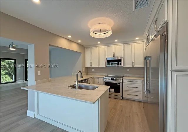 Photo 3 of Single family home for sale at 410 Sw 56th Ave, Plantation, FL 33317 | MLS# A11997367 | Listing updated on 2026-09-14