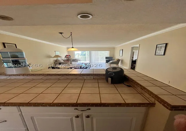 Photo 4 of Sale Pending at 3200 N Palm Aire Dr #407, Pompano Beach, FL 33069 | MLS# A12001266 | Listing updated on 2026-09-04