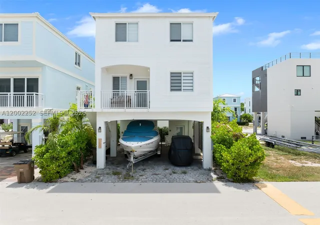 Photo 1 of Single family home for sale at 94825 Overseas Hwy 100, Key Largo, FL 33037 | MLS# A12002252 | Listing updated on 2026-09-14