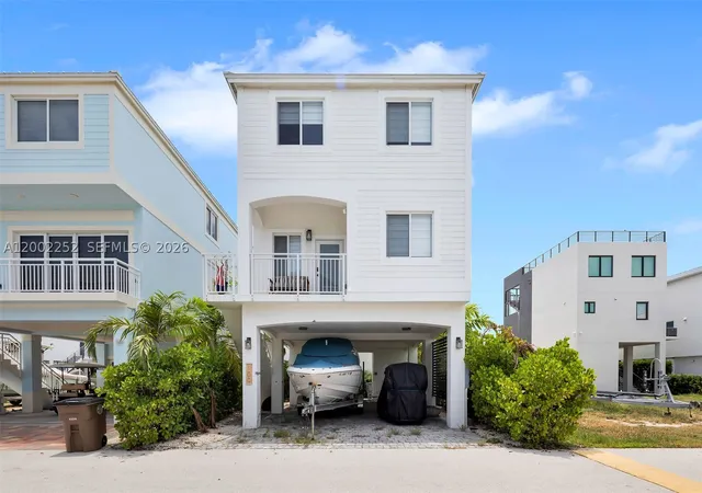 Photo 3 of Single family home for sale at 94825 Overseas Hwy 100, Key Largo, FL 33037 | MLS# A12002252 | Listing updated on 2026-09-14