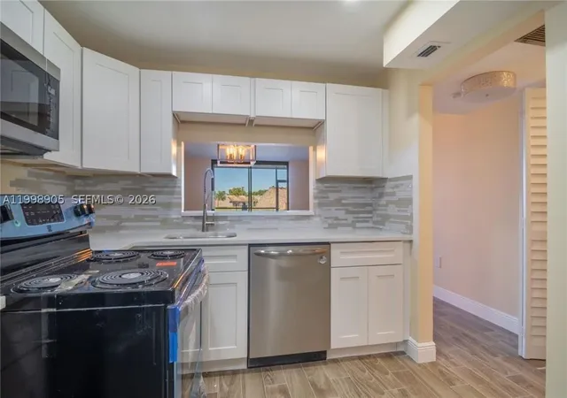 Photo 3 of Condo for sale at 1100 Colony Point Cir #105, Pembroke Pines, FL 33026 | MLS# A11998905 | Listing updated on 2026-09-29