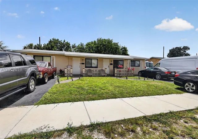 Photo 2 of Multi family home for sale at 5814 Cleveland St, Hollywood, FL 33021 | MLS# A12003113 | Listing updated on 2026-10-07