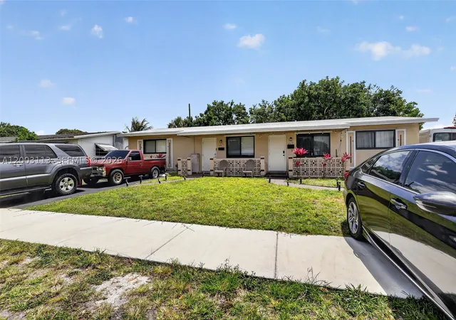 Photo 3 of Multi family home for sale at 5814 Cleveland St, Hollywood, FL 33021 | MLS# A12003113 | Listing updated on 2026-10-07
