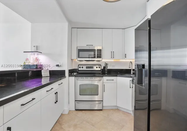 Listing Photo 5 - Condo for sale in building located at 7501 E Treasure Dr, North Bay Village, FL 33141 - Unit #4EF