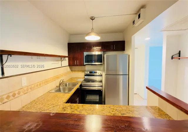 Photo 3 of Condo for sale at 5855 Washington St #90, Hollywood, FL 33023 | MLS# A12003602 | Listing updated on 2026-09-15
