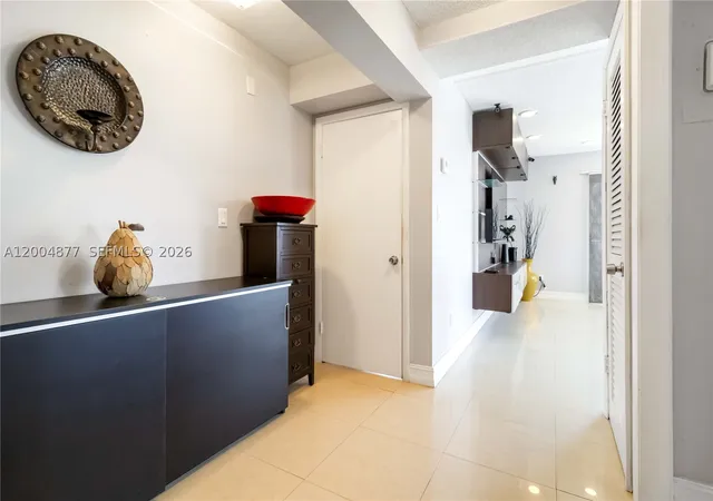 Photo 3 of Condo for sale at 126 Golden Isles Dr #32A, Hallandale Beach, FL 33009 | MLS# A12004877 | Listing updated on 2026-09-19