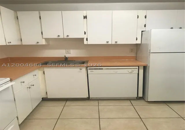 Photo 2 of Condo for sale at 5112 Nw 79 Av #201, Doral, FL 33166 | MLS# A12004684 | Listing updated on 2026-09-14